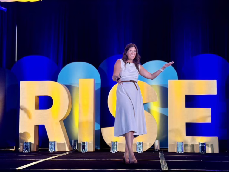 Ema Roloff delivering a keynote on stage